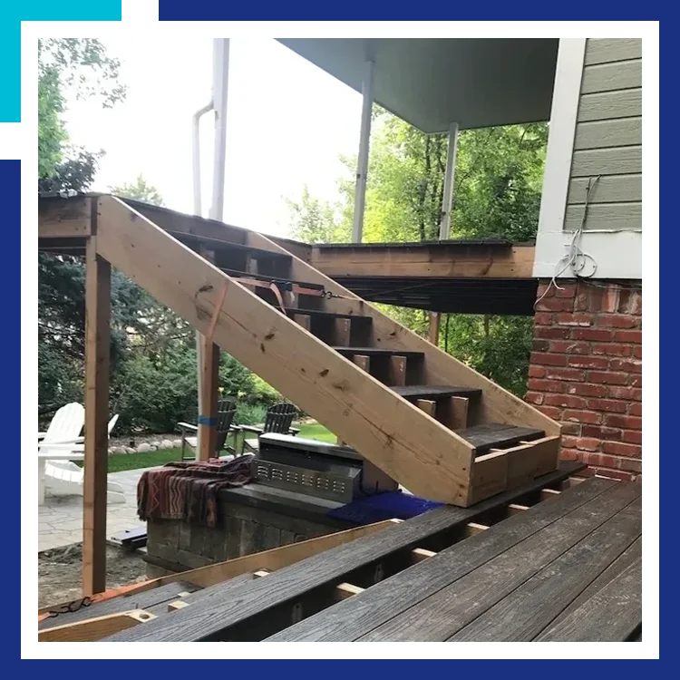 A wooden staircase that is being built.