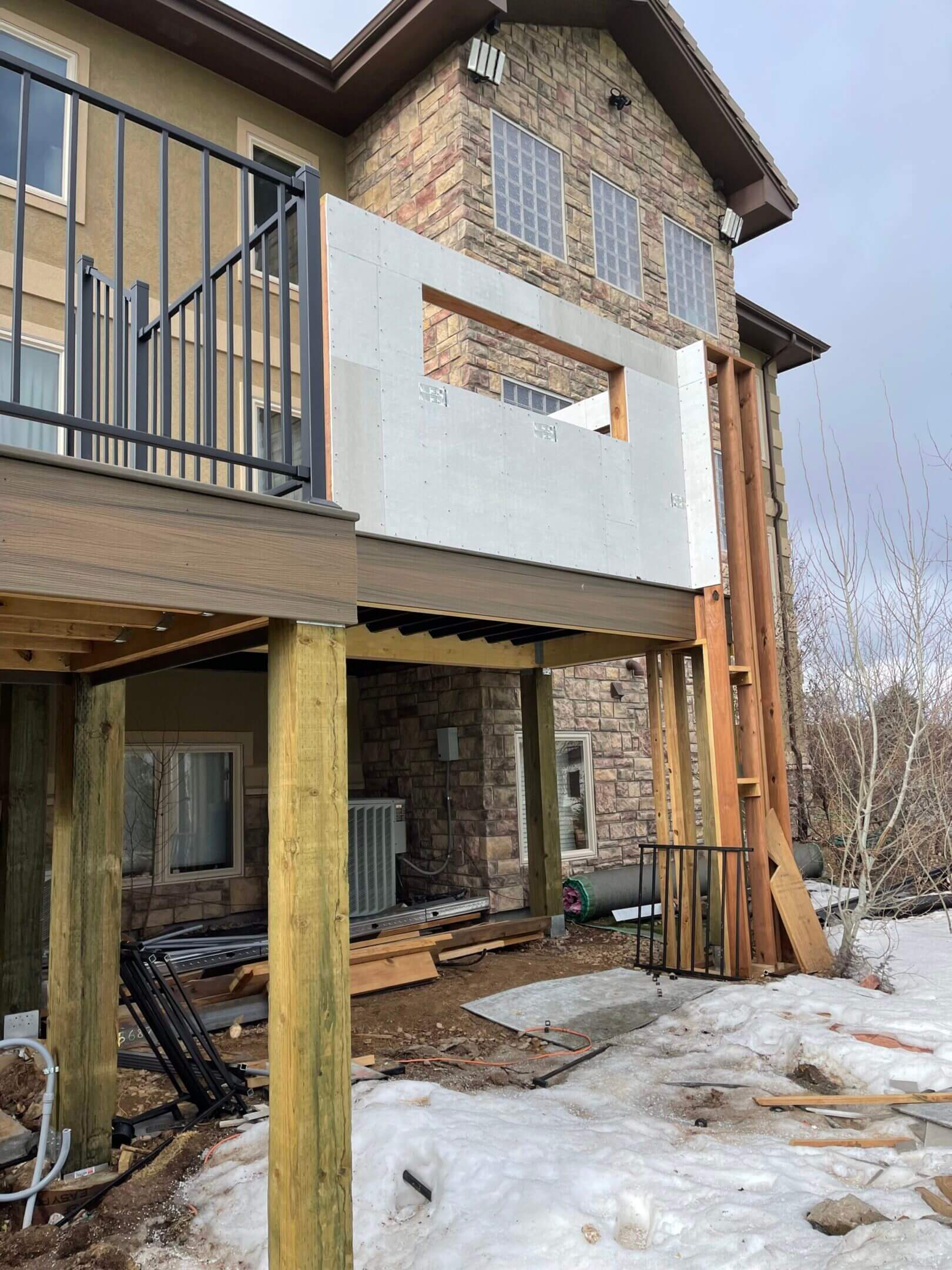 Deck construction under snowy conditions.