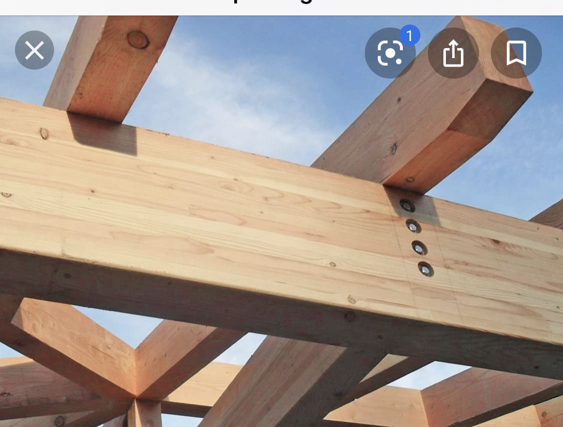 Wooden beams and joints in construction.
